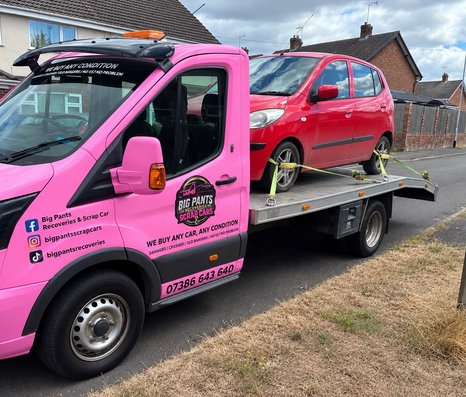 car on pink truck