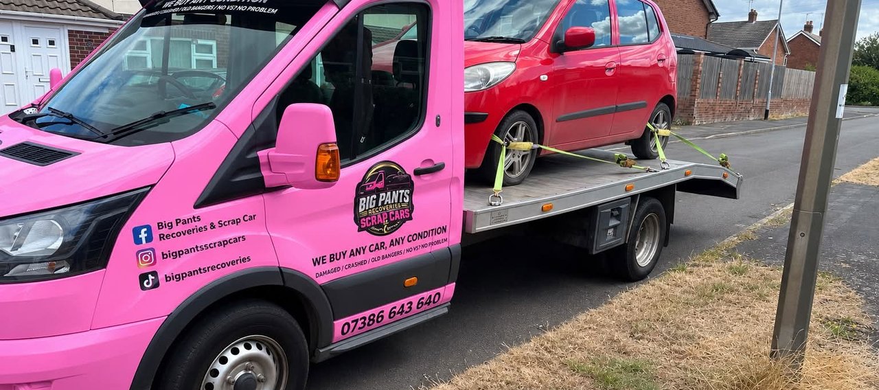 car on pink truck