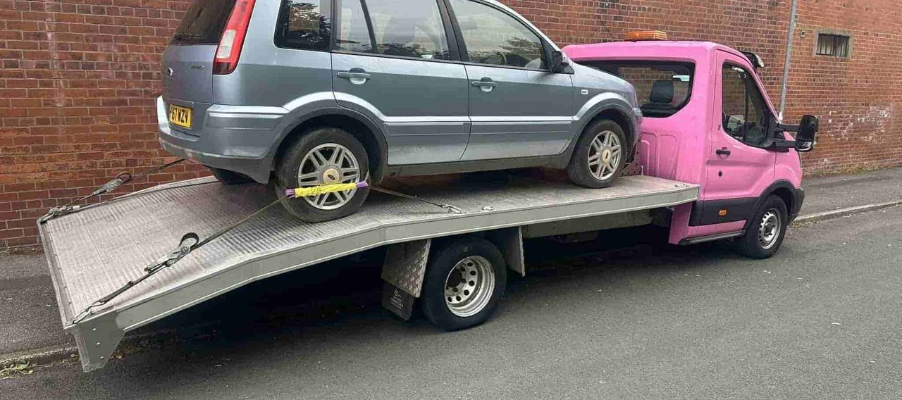 vehicle recovery truck recovering a vehicle